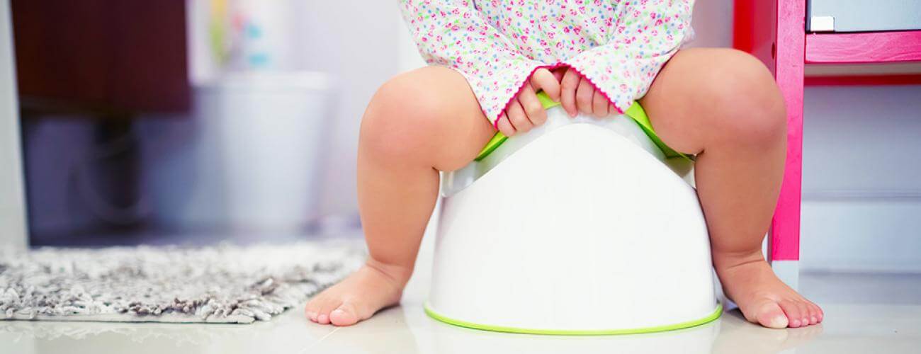 child using childrens potty